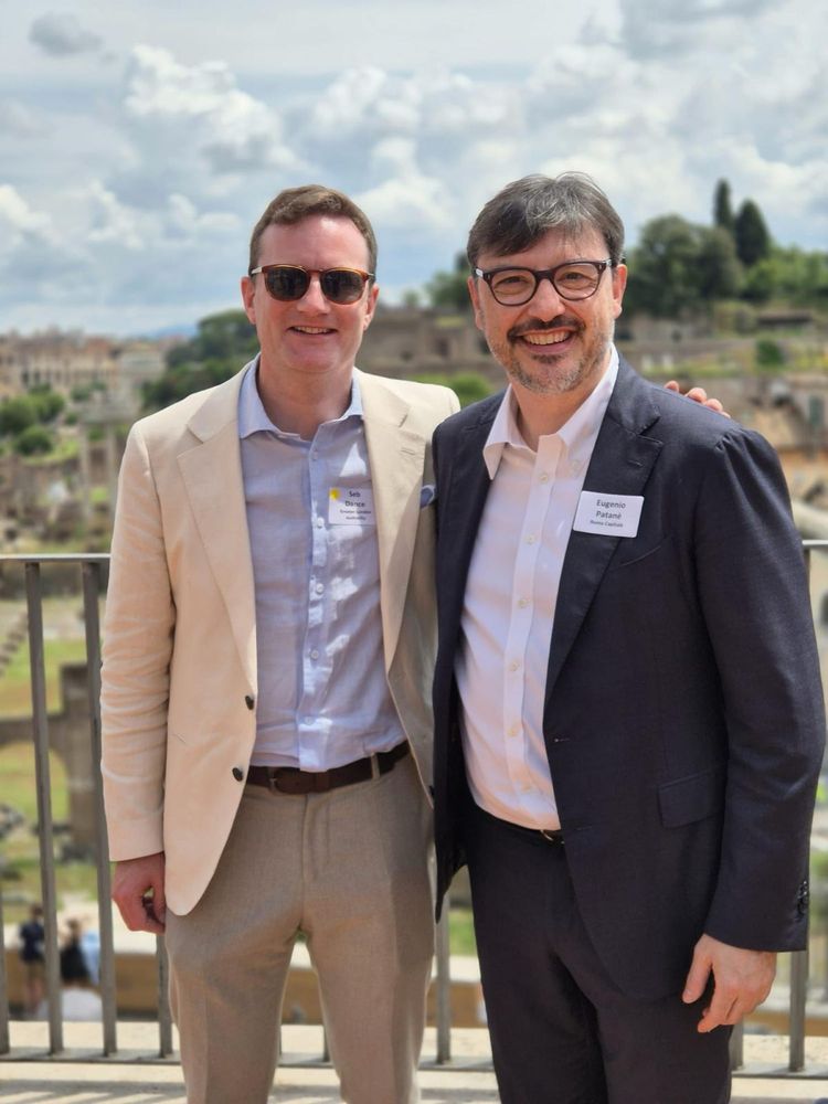 Seb stands with Rome’s Deputy Mayor for Transport, Eugenio Patanè, with the Roman Forum in the background