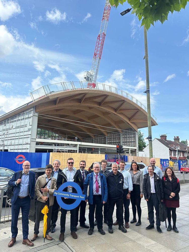 A group photo outside Colindale Station