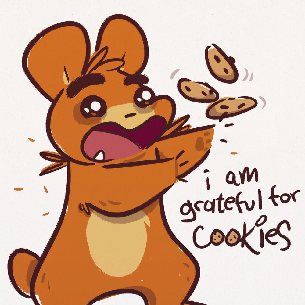 Bear cheers as chocolate cookies fall from the sky. Reads "I am grateful for cookies"