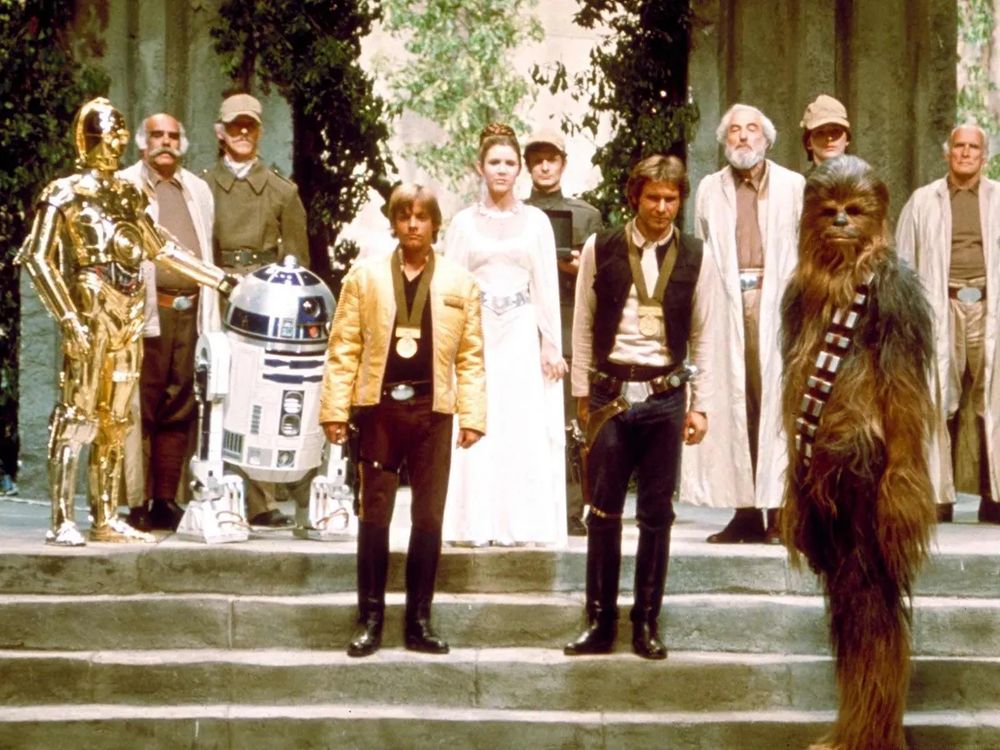 The Star Wars cast at the ending of A New Hope in the throne room 
