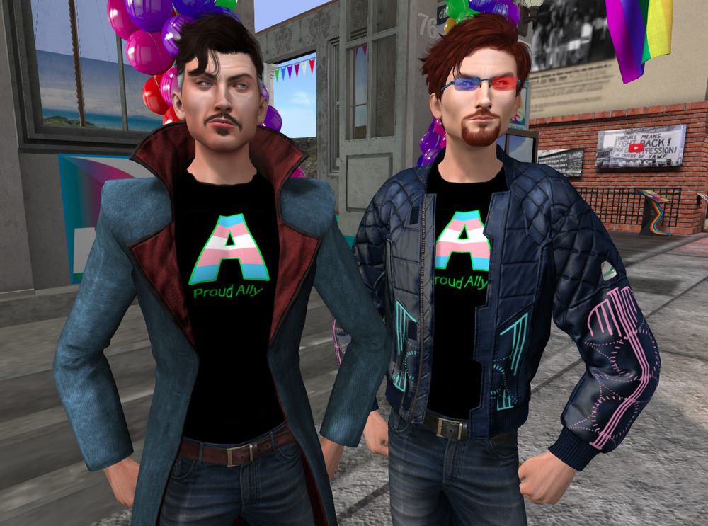 Strange & Holocluck Henly pose in their Trans Ally shirts. You can get them FREE for BoM/classic as well as Dinkie & Tiny avatars in #SecondLife by checking Holocluck's profile picks inworld.