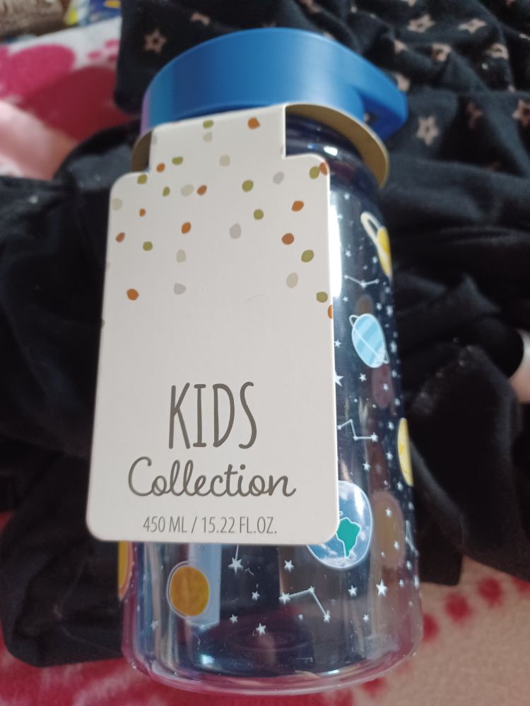 A plastic bottle with space decoration.