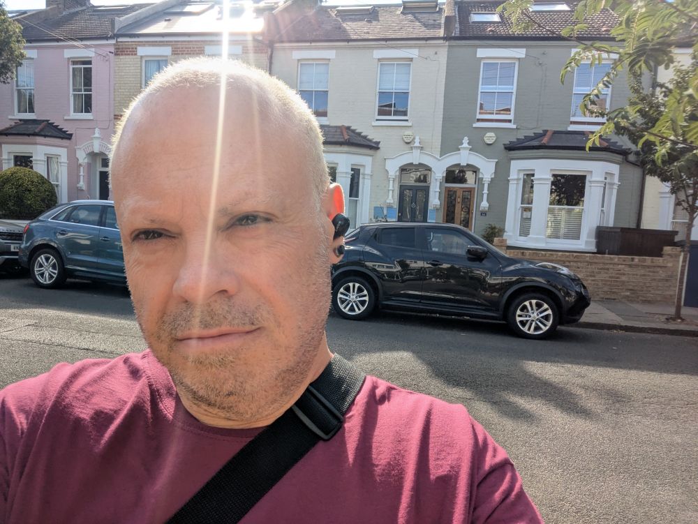 A fat bloke outside 54 Festing Road. He needs a shave.