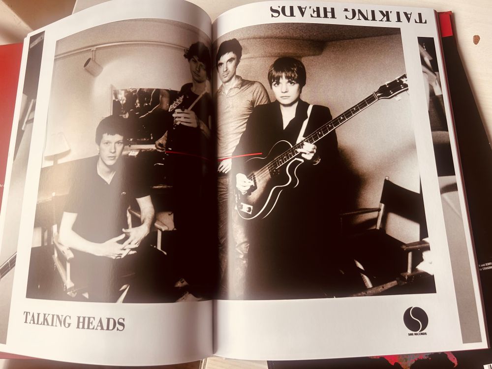 More Songs About Buildings And Food deluxe reissue - band looking enigmatic in sepia 