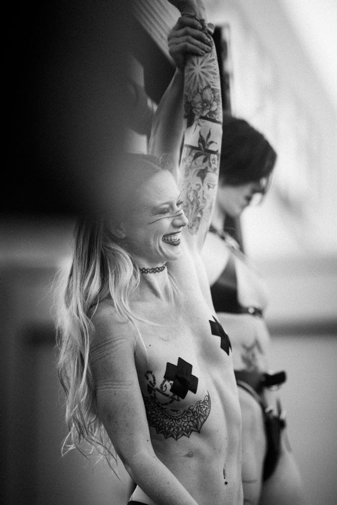 Black and white photo of two people doing rooe