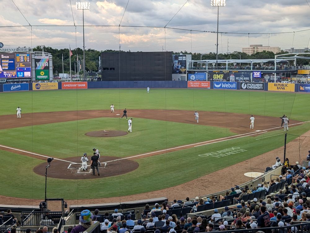 It's a muggy September evening in Tampa at George M. Steinbrenner Field. Green gras. Wet air. Concrete seating bowl.