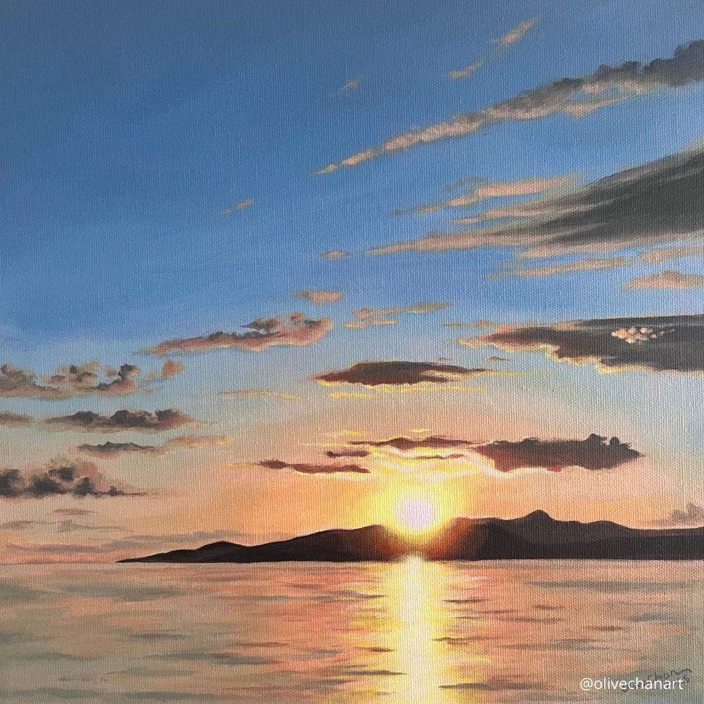 A square painting of the sun setting just behind mountains, reflected in the ocean. There are a few clouds in the sky. 