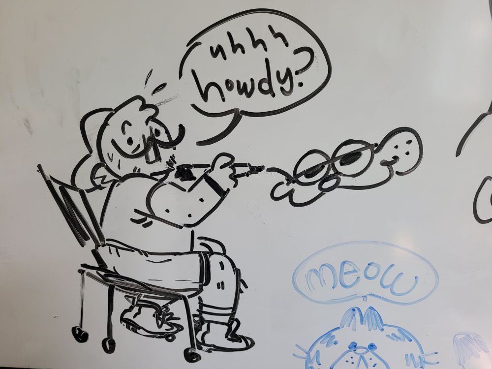 A white board doodle of the artist, sitting in a chair and drawing garfield in front of himself. his head is turned over his shoulder in surprise with a speech bubble that says uhhh howdy?