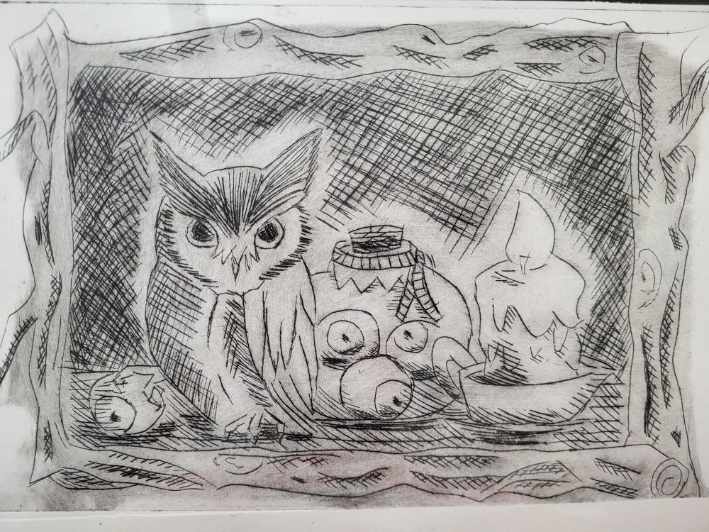 A stamp piece - a small owl clutching an eyeball with a jar of eyeballs behind them. Also a little candle next to the jar. Whole image has a drawn in wooden frame