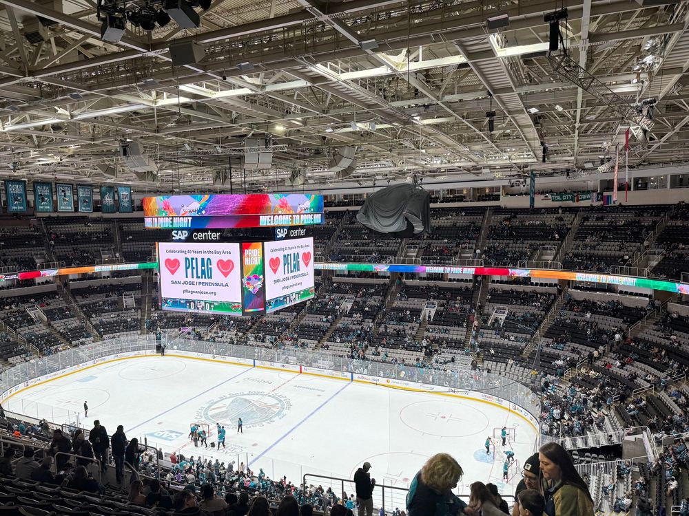 Inside SAP center a hockey rink with the lights on.
