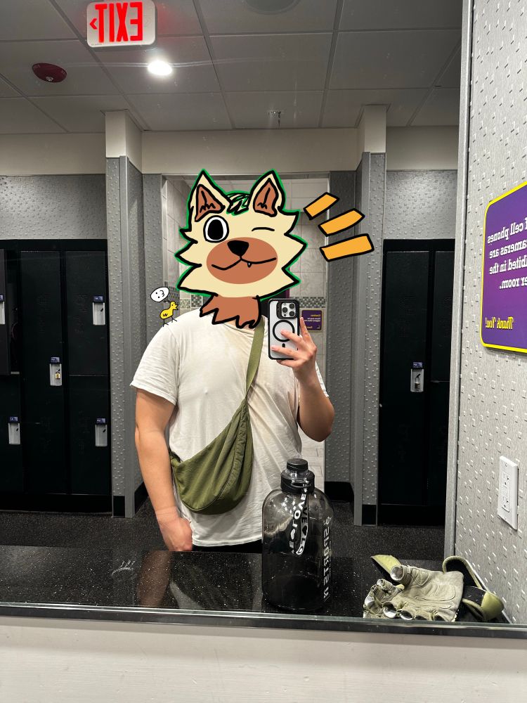 Wolferie is taking a picture after finishing a gym session.