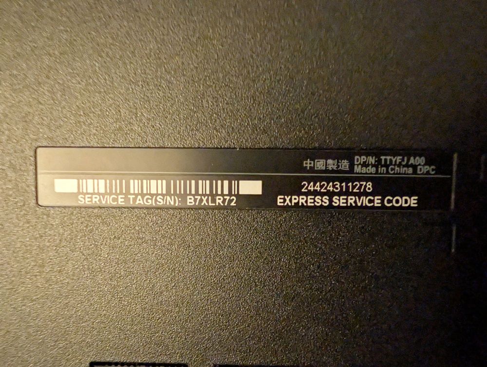ID sticker for an old Dell laptop.