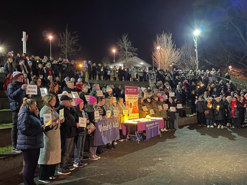 A large crowd attending a candlelight vigil in Solitude Park, Banbridge. 