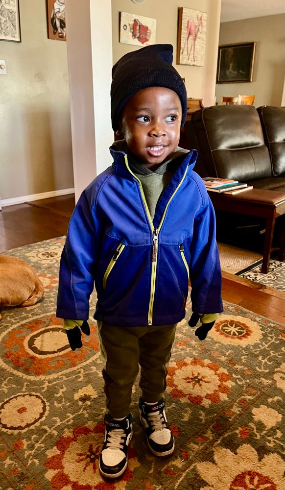 I told our tiny Quintyn he looked like a "model" when I took this picture. Now every time he wears his beanie he says "I look like a model" 😂💖