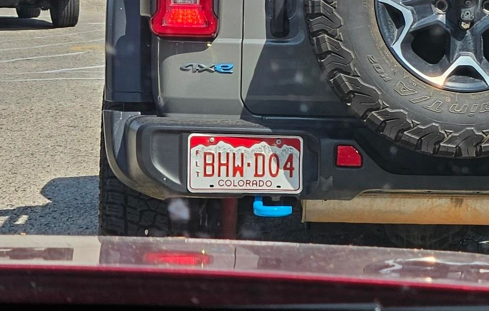 Very ugly Jeep (is there another kind?) with Colorado license plate BHW-D04
