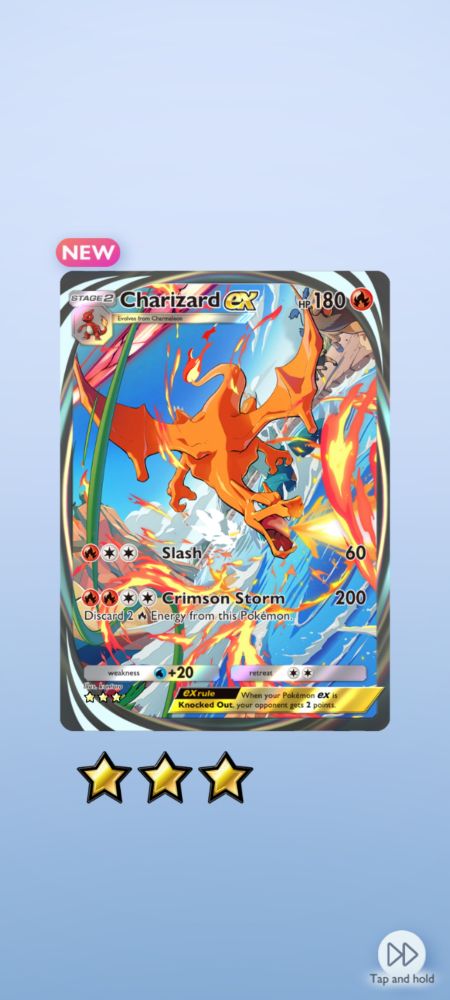 Print da tela do celular no jogo tcg pocket. A imagem é uma carta do charizard ex saída do booster pack