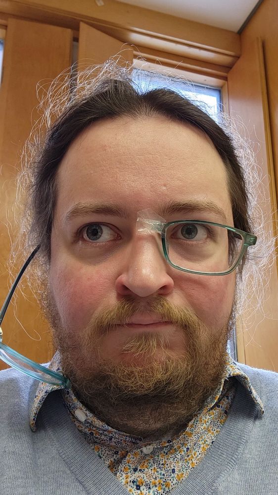 Me, 5 seconds later. The right half of my glasses have fallen off my face and are dangling from my ear. I have a very dejected expression, slowly realizing that my plan isn't working.
