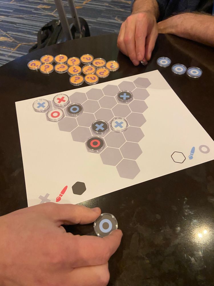 Playtesting one of my weird Hex variants. This one’s called Triplecross and it will probably melt your brain.