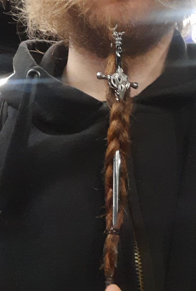 Masqueread's braided beard with a hair sword threaded in.