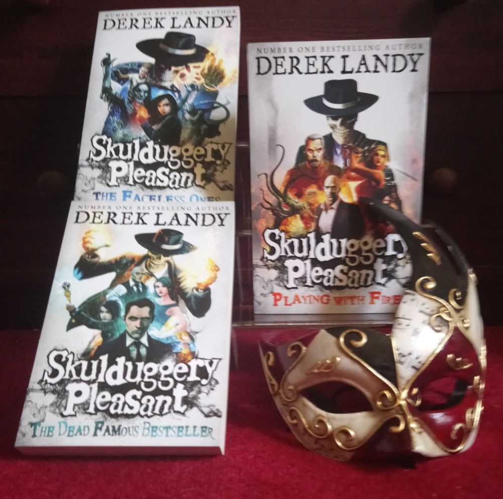 Skulduggery Pleasant 1-3 + Masquerade mask.