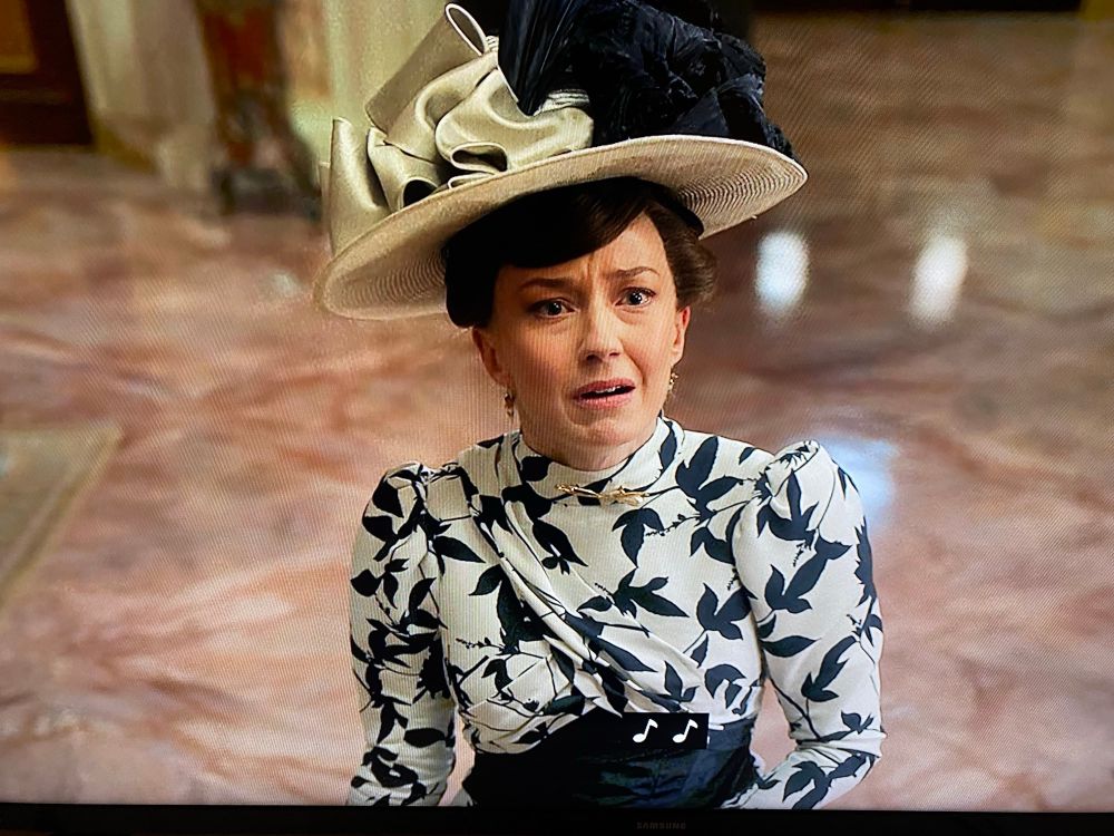 Actress portraying Bertha Russell looks horrified and shocked in HBO Max’s The Gilded Age. 