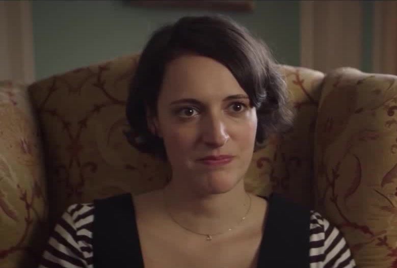 A still from the scene in Fleabag where she's sitting with the therapist and says "I wanna fuck a priest"