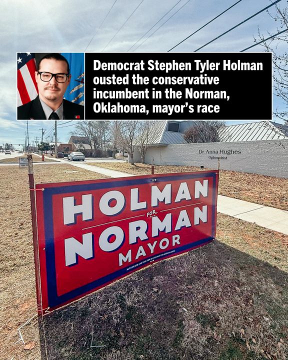 Graphic featuring a campaign sign for Stephen Tyler Holman that reads "Holman for Mayor" placed on a grass verge with a residential area in the background, with text that reads:

'Democrat Stephen Tyler Holman ousted the conservative incumbent in the Norman, Oklahoma, mayor’s race'