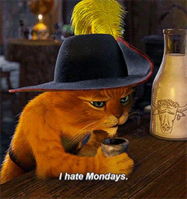 a cat wearing a hat and holding a cup says i hate mondays