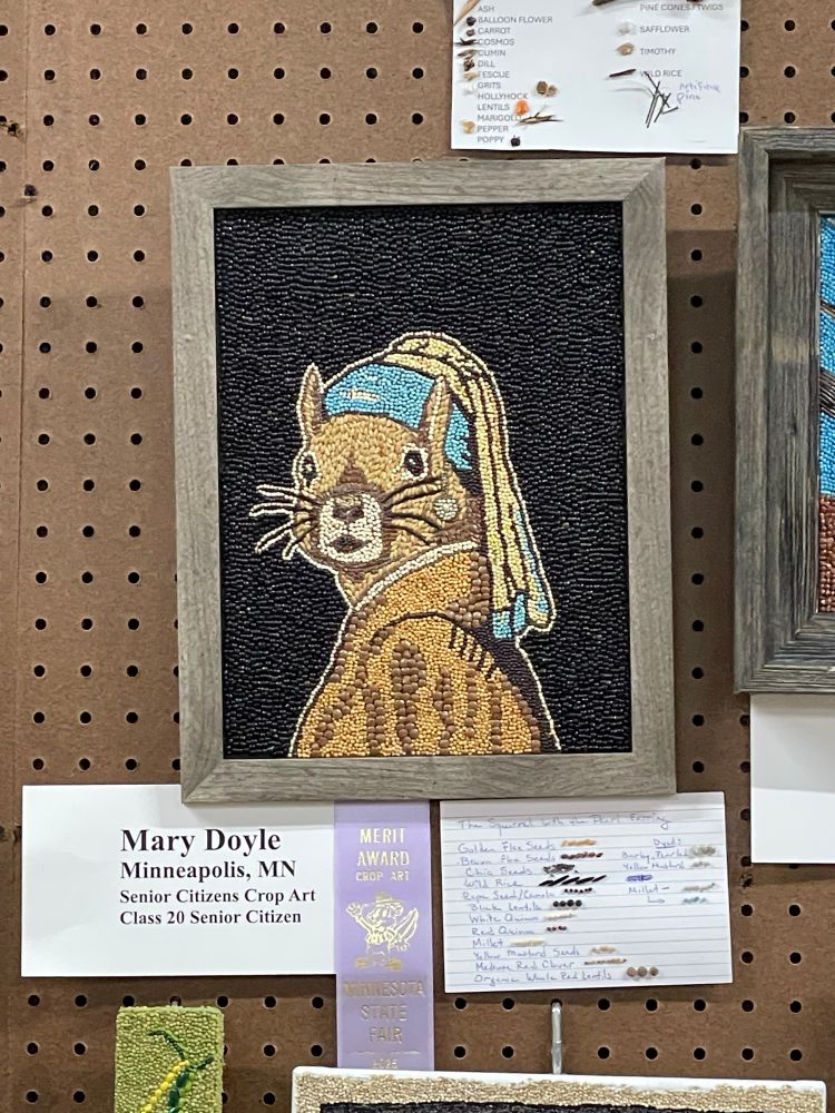 Seed art of Vermeer’s Girl with a Pearl Earring except it’s a squirrel. 