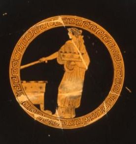 Red figure Kylix, woman standing, facing left, opening chest. Box or tray in left hand. Created 480-470 BCE.