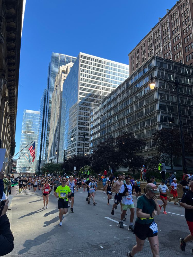 Chicago marathon with runners and buildings