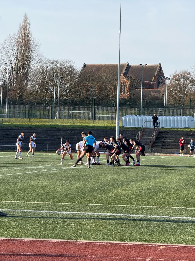 Rams half-back passes from the base of the scrum