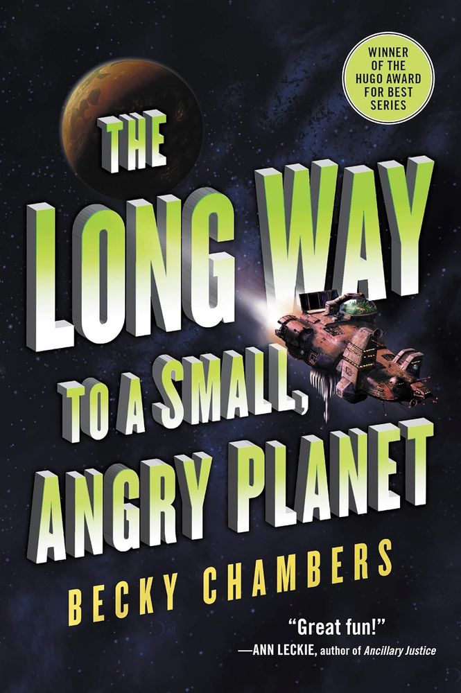 Cover for the book 'The Long Way to a Small, Angry Planet' by Becky Chambers. The title is in large, blocky 3D print with a yellow to white horizontal gradient. The background has an almost Mars-like orange planet in the top right in a star-filled space. The foreground has a unique little spaceship flying towards the planet. The spaceship has an orange-ish hull and a dome at the top. It is asymmetrical with various protrusions around the ship for all the different interior rooms.