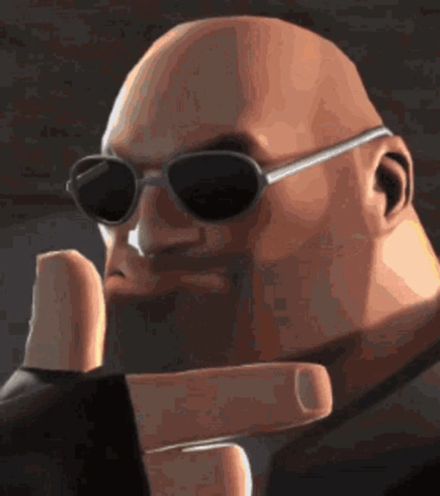 a bald man wearing sunglasses and a black jacket is making a peace sign .