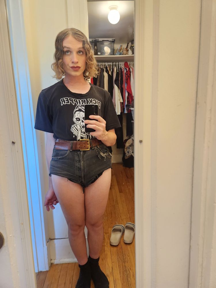 Girl Alex Haus of Decline. Marlene Dietrich type. Shorts are high and tight exposing thighs with healthy thick admixture of fat and muscle.