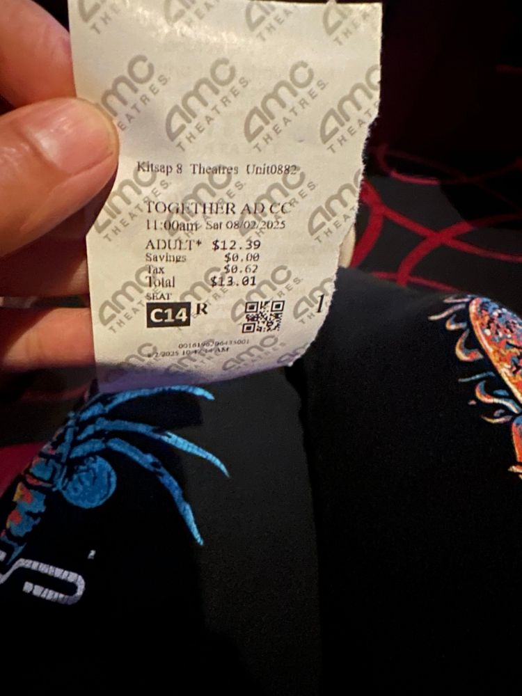 Gem holding a together movie ticket wearing some very nice Aliens sweatpants 
