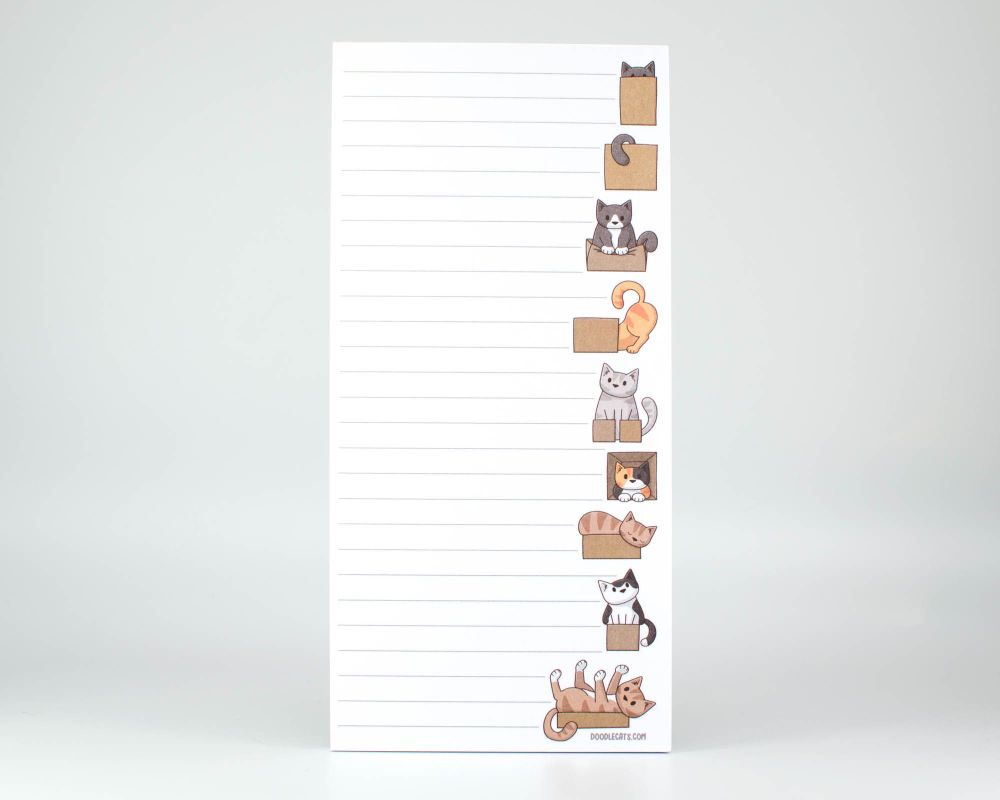 a list notepad with grey lines on white. along the right hand side of the pad are cartoon cats in boxes. some are sitting normally, others are squished in, upside down,  hiding and sleeping