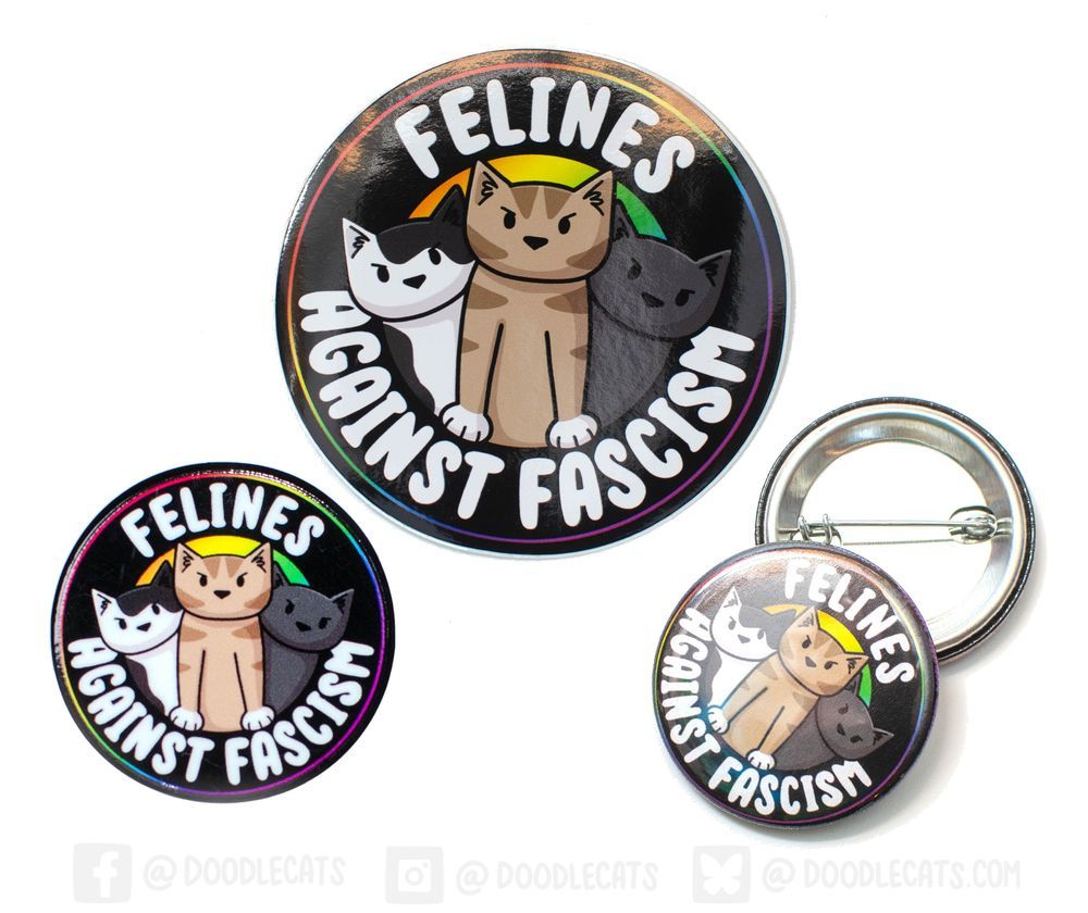 a sticker, button badge and acrylic pin all with the same design its a black circle. in the centre are three angry cats. white text around them says Felines Against Fascism