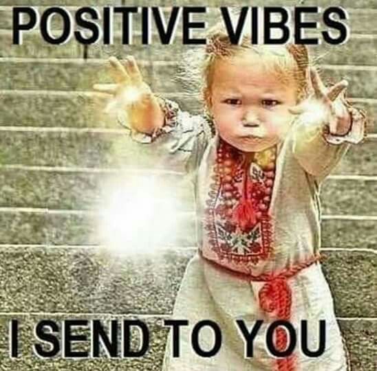 Picture of a young girl in ethnic dress throwing a ball of energy, with the words 'Positive Vibes I Send To You' superimposed.