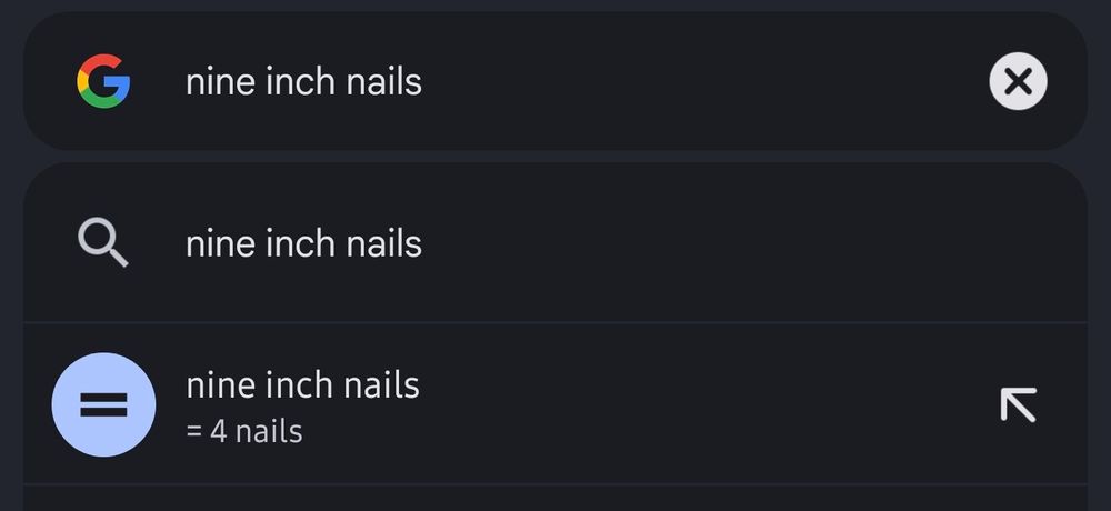 A screenshot of Google search. The search term is nine inch nails. Google has suggested a conversion which reads: nine inch nails = 4 nails. 