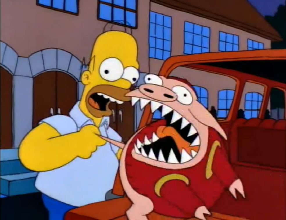 Scene from The Simpsons with Homer pulling the tail of Sir Oinks-A-Lot, the live pig mascot of Springfield A&M. The pig does not appreciate the tail pulling and turns its head, fangs bared to bite upon the hand which torments its so.