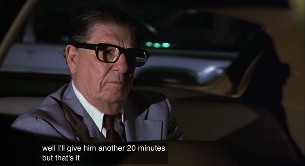 Man waiting in taxi at the end of Airplane! The Movie