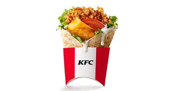 A wrap from some KFC with big drips of white goo coming down the sides of it 