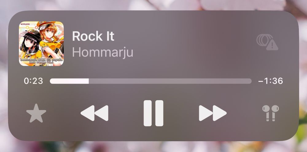 the iPhone music player UI showing “Rock It” by Hommarju from beatmania IIDX 23 copula Music Selection, Vol. 2 playing, specifically at 0:23 👀