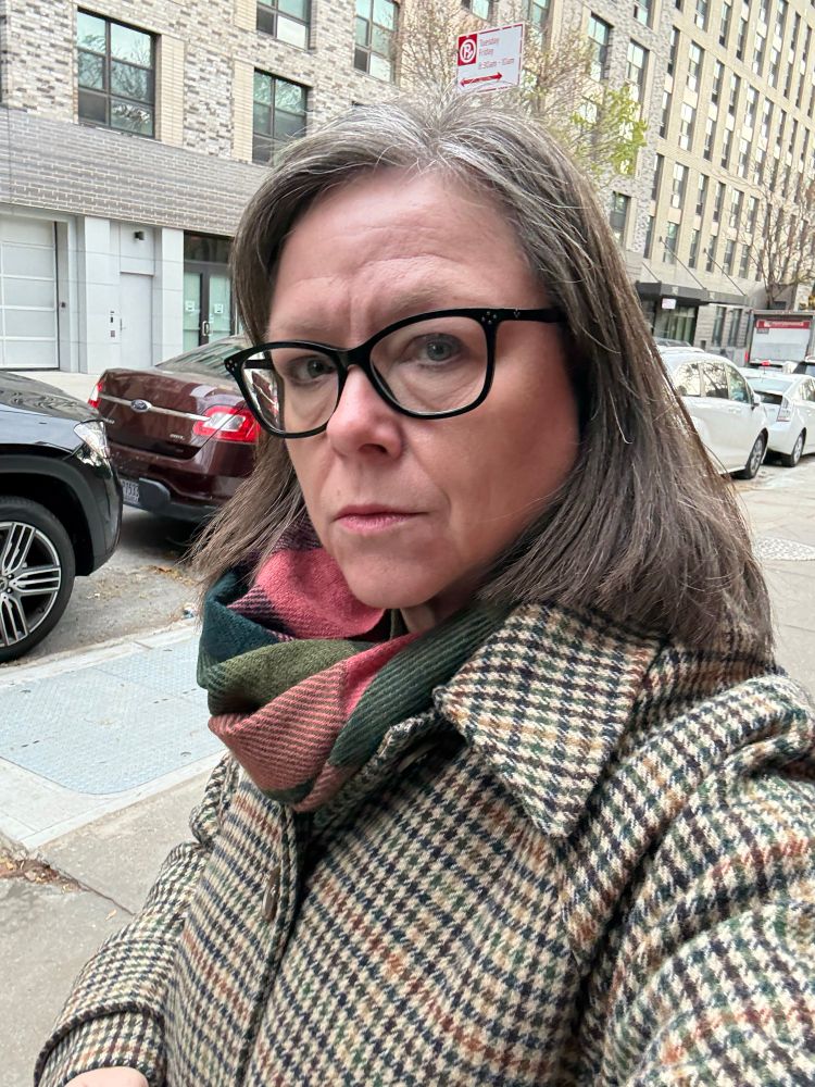 Picture of an enraged, middle aged white lady barely holding it in. 
Also she’s wearing a cute plaid coat and scarf. 