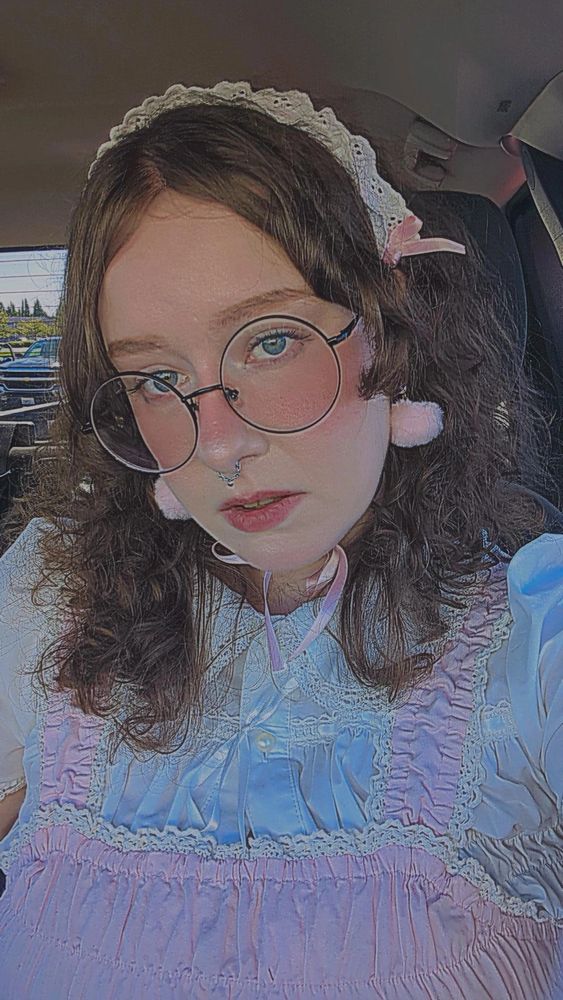 a selfie. i'm wearing a pink and white egl fashion coordinate.