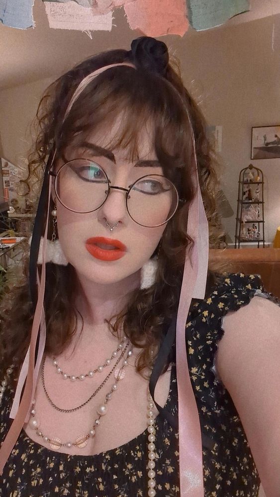 i'm dressed as a member of strawberry switchblade; 80s goth style.