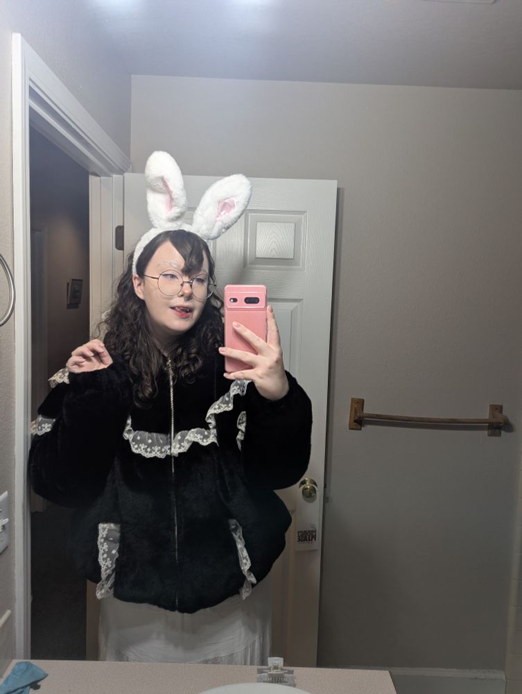 i'm wearing fluffy bunny ears, i've pointed my bangs into a widows peak, my eyebrows are white, and i've got tomato juice dripping from my fanged mouth.