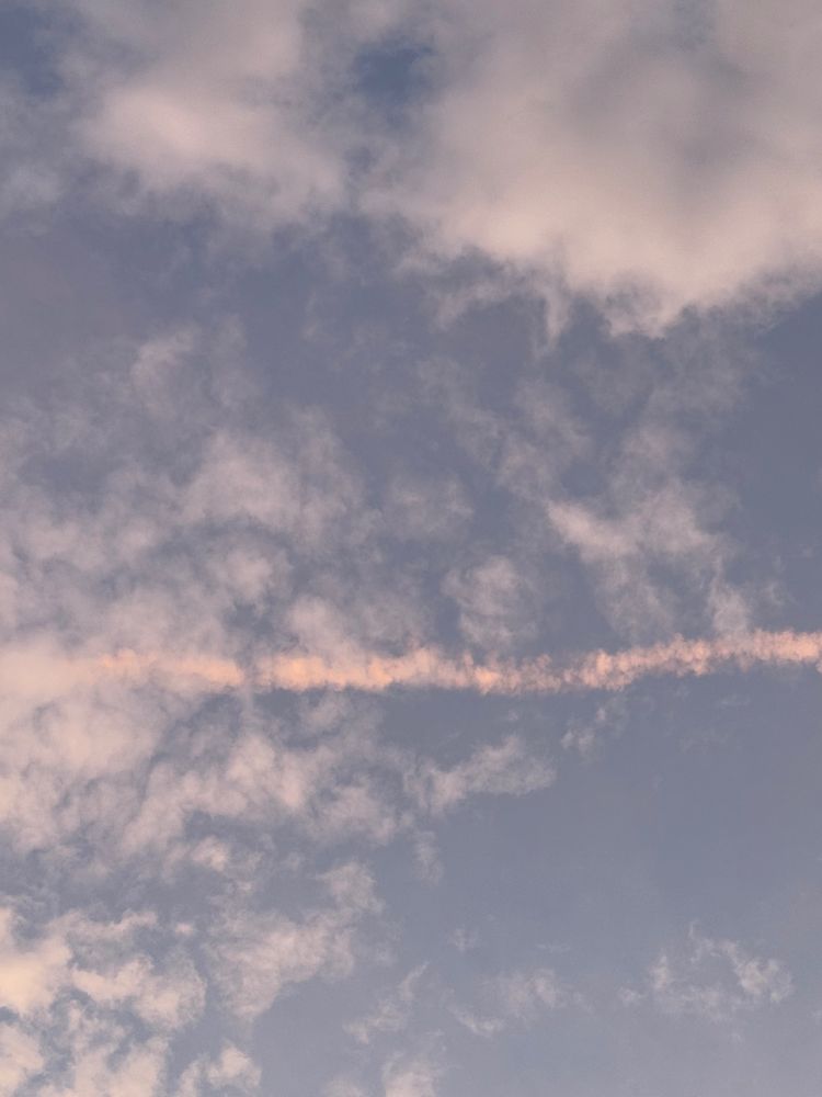 Skyscape near sunset with pink, white, light blue/grey blue, in the style of Rothko’s canvas shapes.