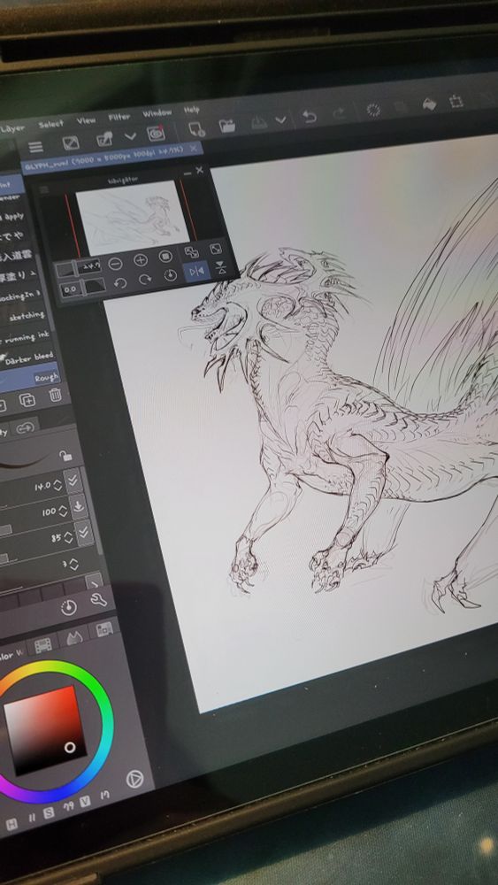 Photo of a digital drawing being done on a tablet. It is a sketch of a unique dragon with feathered wings for back legs and normal front legs. It has a massive rack of horns that point both forwards and backwards. It has no eyes, and a mouth like a python.